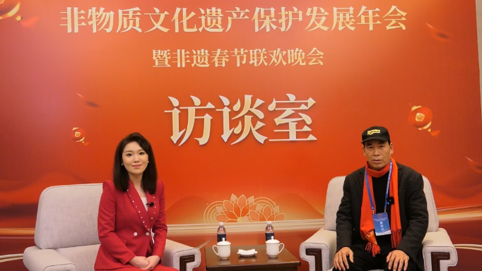 著名书法家谢天雨受邀出席非物质文化遗产保护发展年会暨非遗春节联欢晚会