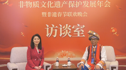 覃九宏--受邀出席非物质文化遗产保护发展年会暨非遗春节联欢晚会