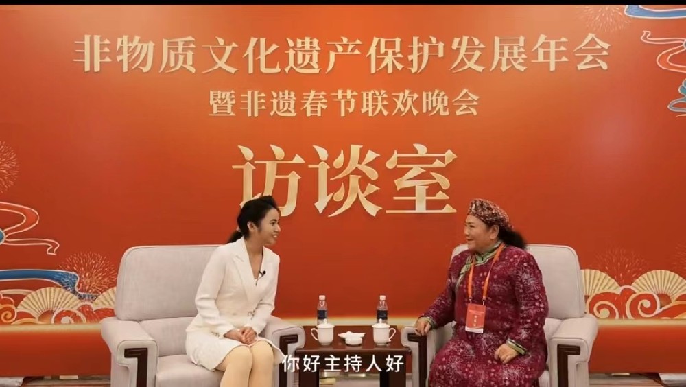 著名摄影家韩宝花受邀出席非遗保护发展年会暨非遗春节联欢晚会